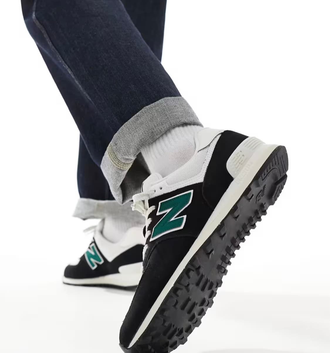 New Balance 574 trainers in black and green — image 1 of 3