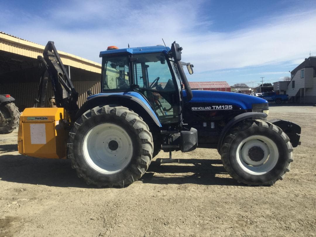 2005 New Holland TM135 Tractor — image 1 of 2